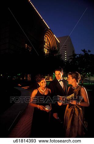 Stock Image - Stock photo of theater goers outside of the Hobby Center in Houston Texas after a night show. Fotosearch
