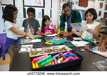 Stock photo of young students participating in art class at Lovett Elementary School in Houston Texas View Large Photo Image Stock Photograph - Stock photo of young students participating in art class at Lovett Elementary School in Houston Texas. Fotosearch