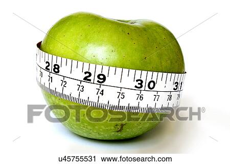 Apple with a tape measure View Large Photo Image Stock Image - Apple with a tape measure . Fotosearch