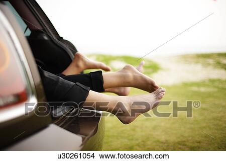 Barefoot in the car View Large Photo Image Picture - Barefoot in the car . Fotosearch