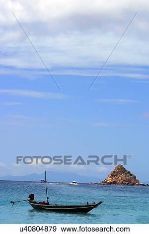 Stock Photo - Boat floating in the sea, . Fotosearch