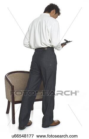 Business man reading View Large Photo Image Stock Photo - Business man reading . Fotosearch