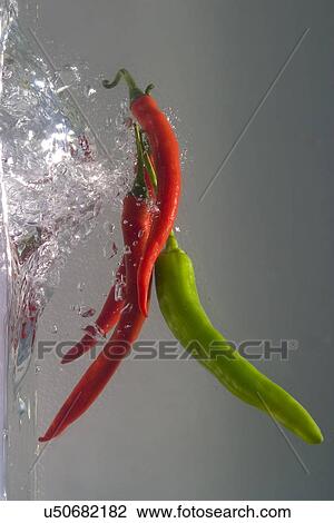 Chili peppers View Large Photo Image Stock Image - Chili peppers . Fotosearch