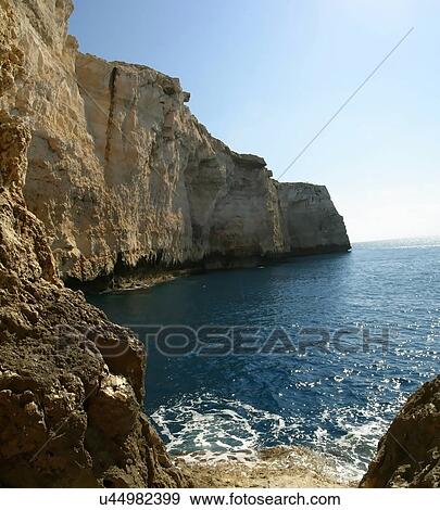 Cliffs to water View Large Photo Image Stock Photo - Cliffs to water . Fotosearch