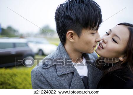 Stock Image - Couple about to kiss. Fotosearch