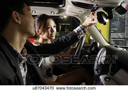 Stock Image - Couple in a car. Fotosearch