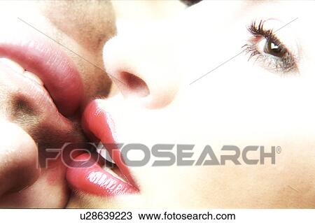 Stock Image - Couple kissing. Fotosearch