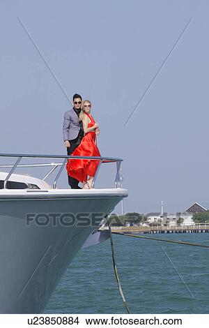 Picture - Couple on a yacht . Fotosearch