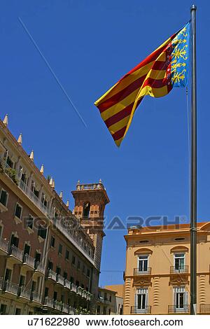 Stock Image - Flag over a city . Fotosearch
