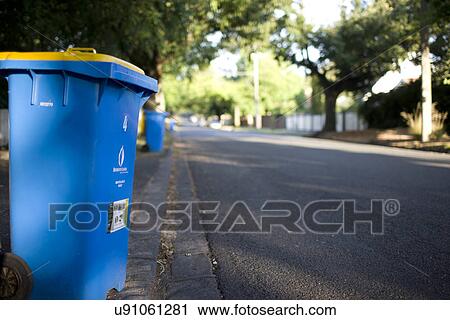 Garbage cans on the street View Large Photo Image Stock Image - Garbage cans on the street. Fotosearch