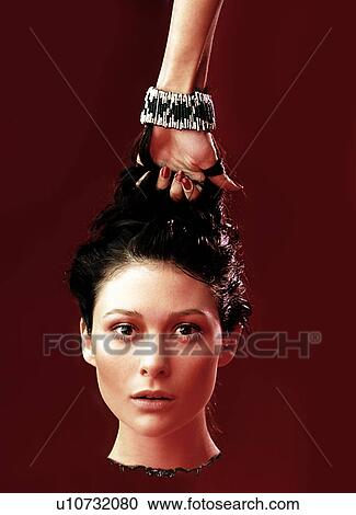 Hand holding human head View Large Photo Image Stock Image - Hand holding human head . Fotosearch