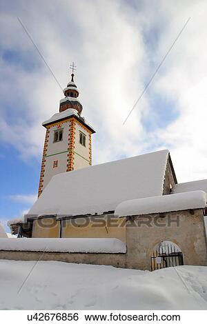 Low angle view of a church View Large Photo Image Stock Photograph - Low angle view of a church. Fotosearch