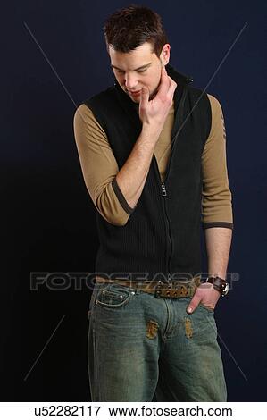 Stock Photo - Man looking down . Fotosearch