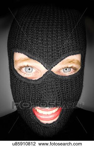 Stock Image - Masked woman . Fotosearch