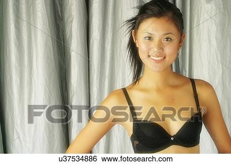 Stock Photograph - Model in a bra . Fotosearch