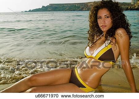 Stock Image - Model on beach. Fotosearch