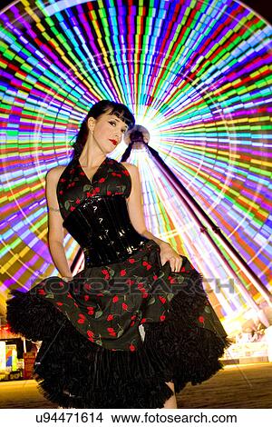 Picture - Pin up woman at a fair . Fotosearch