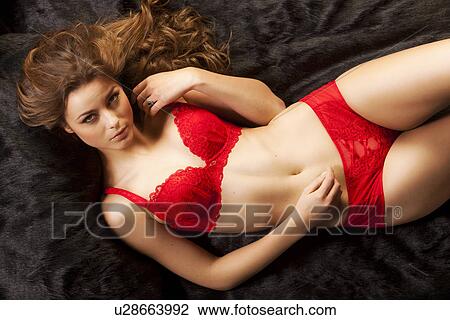 Relaxing sexy woman View Large Photo Image Stock Image - Relaxing sexy woman. Fotosearch
