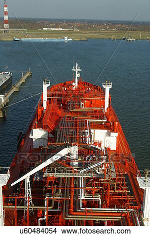 Picture - Ship with many pipes on it. Fotosearch