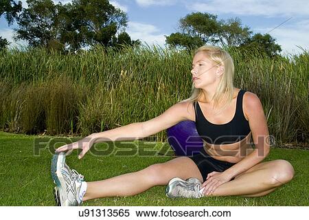 Sitting and stretching View Large Photo Image Stock Photography - Sitting and stretching . Fotosearch