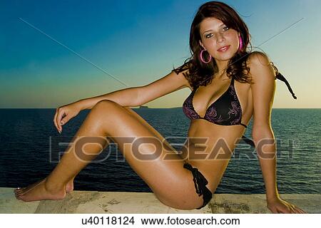 Sitting next to water View Large Photo Image Picture - Sitting next to water . Fotosearch