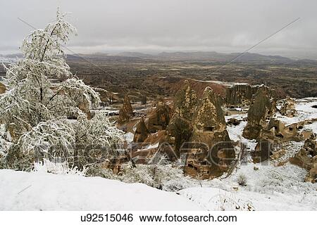Stock Photograph - Snow covered land. Fotosearch