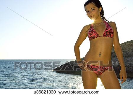 Sunlight behind a bikini model View Large Photo Image Stock Image - Sunlight behind a bikini model . Fotosearch