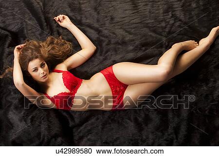Thin woman in red underwear View Large Photo Image Stock Image - Thin woman in red underwear . Fotosearch