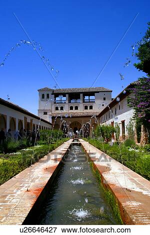 Water fountains in a courtyard View Large Photo Image Stock Photo - Water fountains in a courtyard . Fotosearch