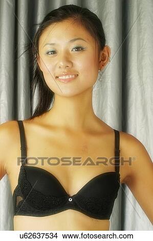 Picture - Woman in a bra . Fotosearch