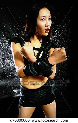 Stock Image - Woman in leather. Fotosearch