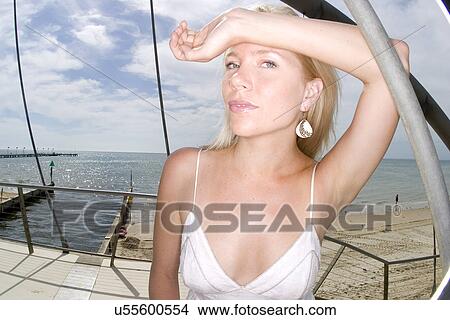 Woman on a pier View Large Photo Image Picture - Woman on a pier . Fotosearch