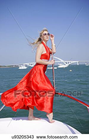 Stock Image - Woman on a yacht . Fotosearch