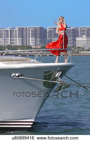 Stock Photograph - Woman on a yacht . Fotosearch