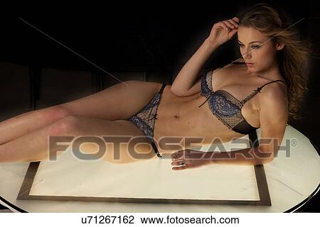 Stock Image - Woman wear lace underwear. Fotosearch