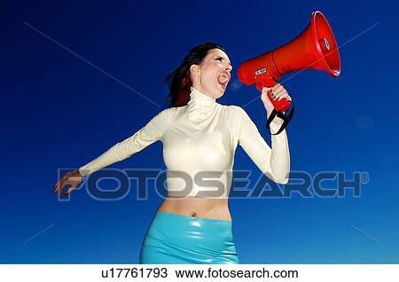 Woman yelling with a megaphone View Large Photo Image Stock Image - Woman yelling with a megaphone . Fotosearch