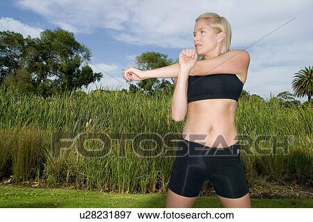 Working out woman View Large Photo Image Stock Photo - Working out woman . Fotosearch