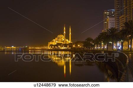 Stock Photo - Altaqwa Mosque at night, Sharjah, United Arab Emirates. Fotosearch