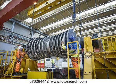 Banksman and crane operator lowering crane to turbine hall during power station outage View Large Photo Image Stock Image - Banksman and crane operator lowering crane to turbine hall during power station outage. Fotosearch