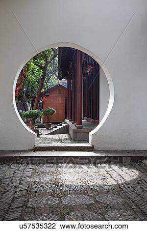 Stock Image - Circular entrance in garden, Suzhou, Jiangsu Province, China. Fotosearch