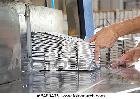 Close up of female hands stacking cardboard packaging View Large Photo Image Stock Photography - Close up of female hands stacking cardboard packaging. Fotosearch