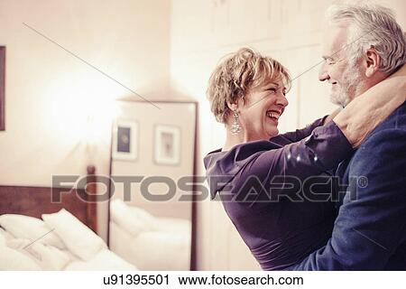 Stock Image - Couple hugging. Fotosearch