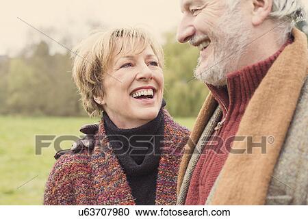 Stock Image - Couple smiling, portrait. Fotosearch