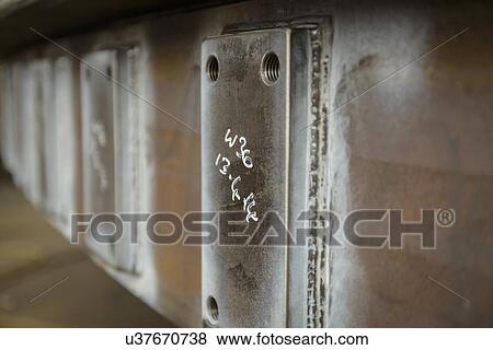 Stock Photo - Detail of steel in marine fabrication factory. Fotosearch