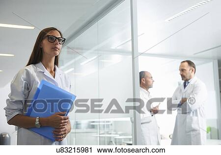 Doctors at work in office View Large Photo Image Stock Image - Doctors at work in office. Fotosearch