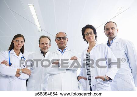 Picture - Doctors posing for group portrait. Fotosearch