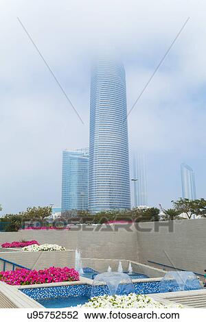 Downtown Abu Dhabi, Landmark Tower, Corniche Flower Beds, United Arab Emirates View Large Photo Image Stock Image - Downtown Abu Dhabi, Landmark Tower, Corniche Flower Beds, United Arab Emirates. Fotosearch