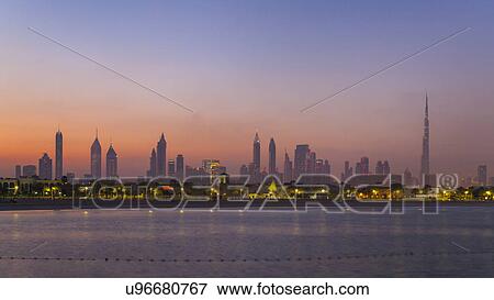 Downtown Dubai, Jumeirah Beach at sunset, United Arab Emirates View Large Photo Image Stock Photo - Downtown Dubai, Jumeirah Beach at sunset, United Arab Emirates. Fotosearch