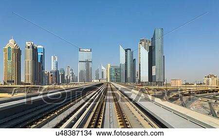 Picture - Downtown Dubai Metro rails, United Arab Emirates. Fotosearch