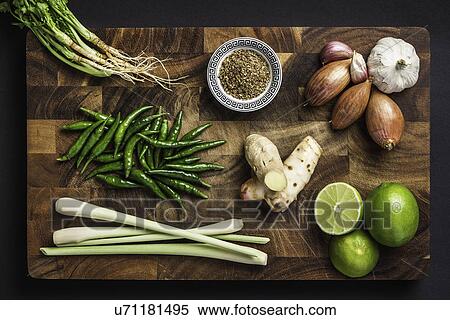Stock Photography - Ingredients for making green curry paste. Fotosearch